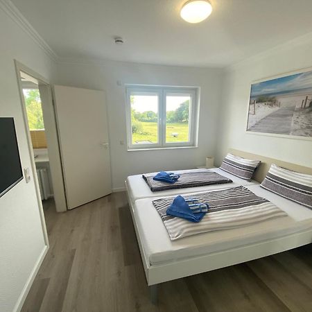 Haus Regina Apartment ทิมเมนดอร์เฟอร์ ชตรันด์ ภายนอก รูปภาพ