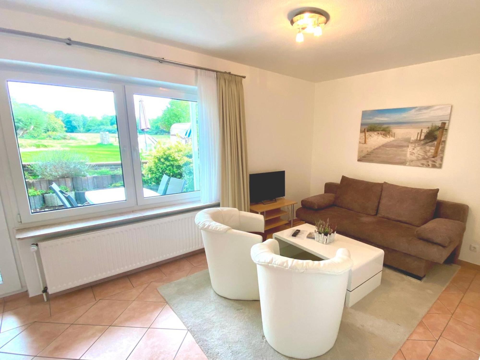 Haus Regina Apartment ทิมเมนดอร์เฟอร์ ชตรันด์ ภายนอก รูปภาพ