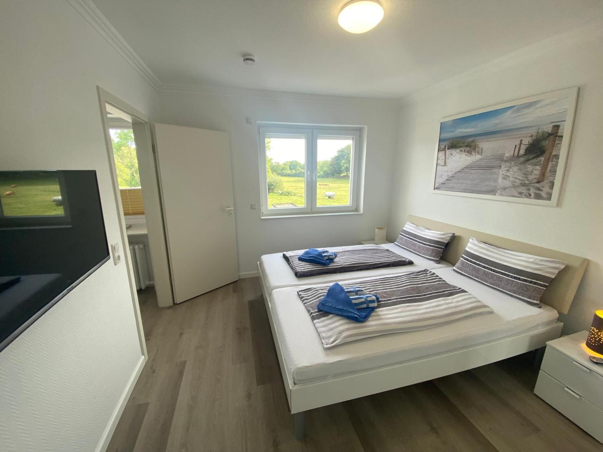 Haus Regina Apartment ทิมเมนดอร์เฟอร์ ชตรันด์ ภายนอก รูปภาพ